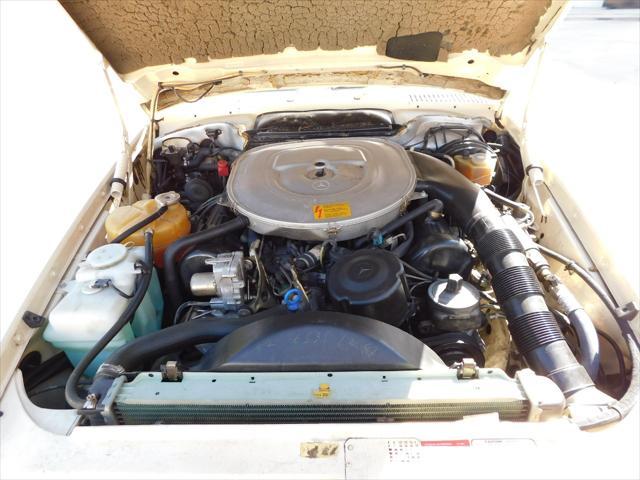 Photo of 1987 Tan Mercedes-Benz 560SL