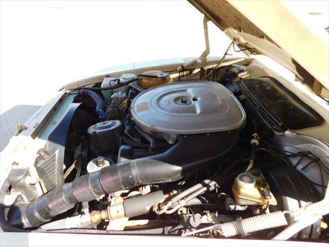 Photo of 1987 Tan Mercedes-Benz 560SL
