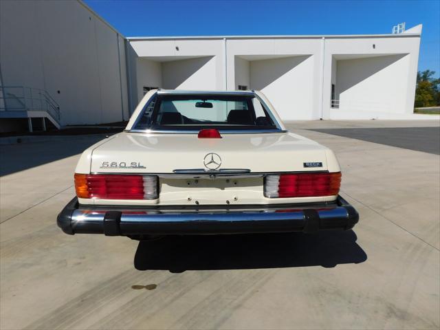 Photo of 1987 Tan Mercedes-Benz 560SL