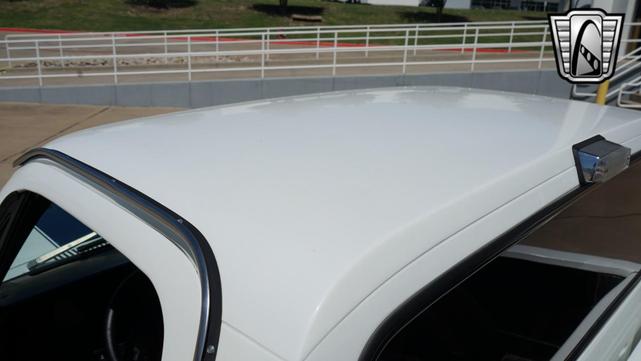 Photo of 1986 White and blue stripe Chevrolet C10/K10