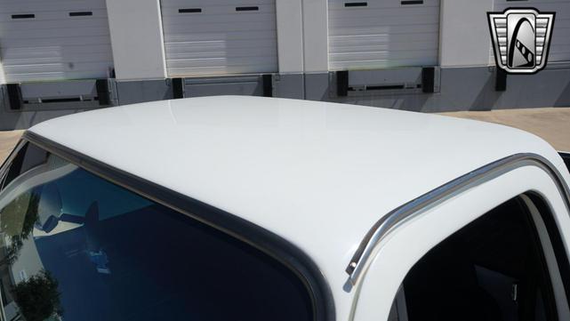 Photo of 1986 White and blue stripe Chevrolet C10/K10