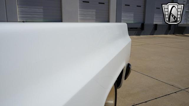 Photo of 1986 White and blue stripe Chevrolet C10/K10