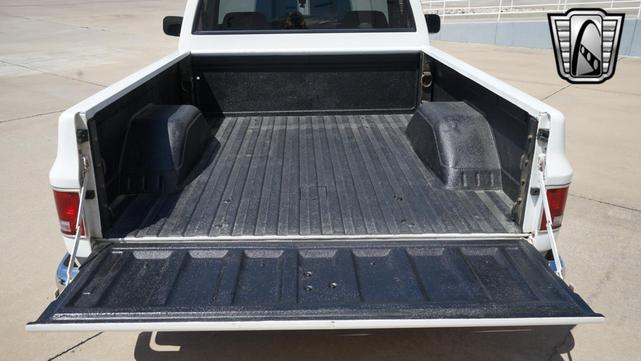 Photo of 1986 White and blue stripe Chevrolet C10/K10