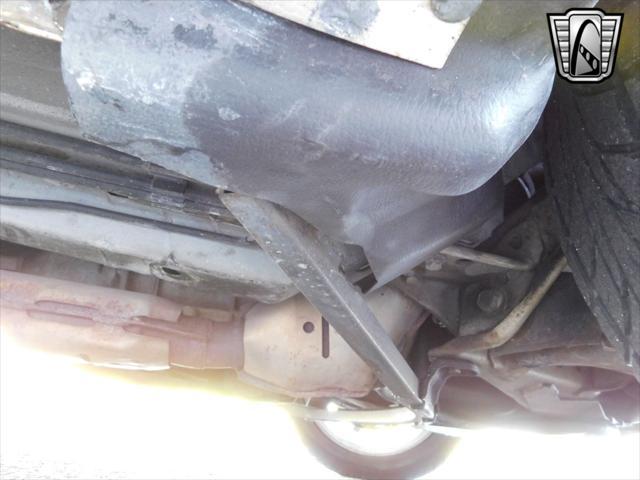 Photo of 1997 White Ford Mustang