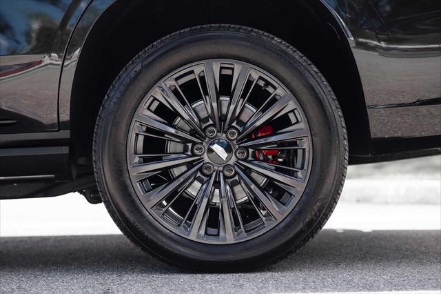 Photo of 2024 Black Diamond Tricoat Cadillac Escalade