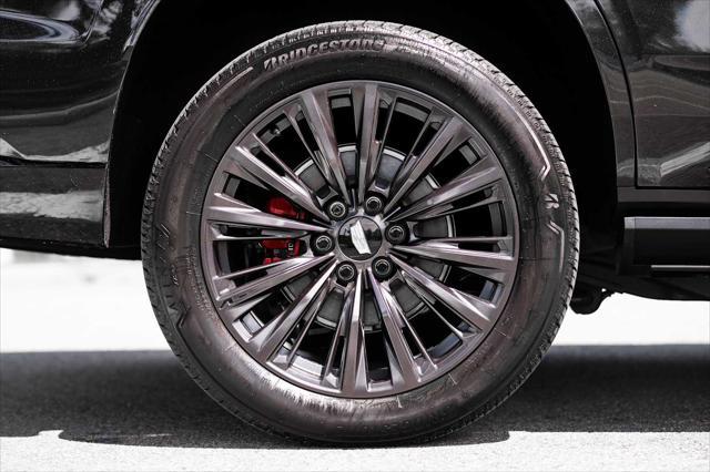 Photo of 2024 Black Diamond Tricoat Cadillac Escalade