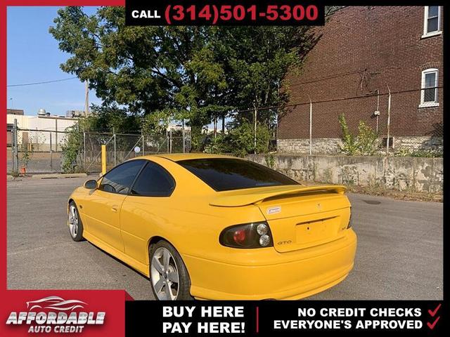Photo of 2004 Yellow Jacket Pontiac GTO