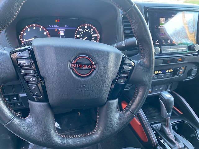Photo of 2023 Glacier White Nissan Frontier