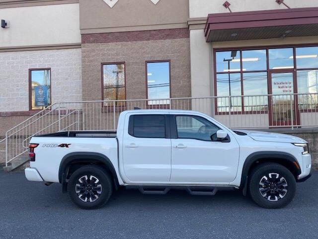 Photo of 2023 Glacier White Nissan Frontier