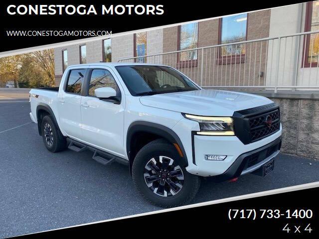 Photo of 2023 Glacier White Nissan Frontier