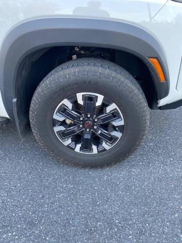 Photo of 2023 Glacier White Nissan Frontier