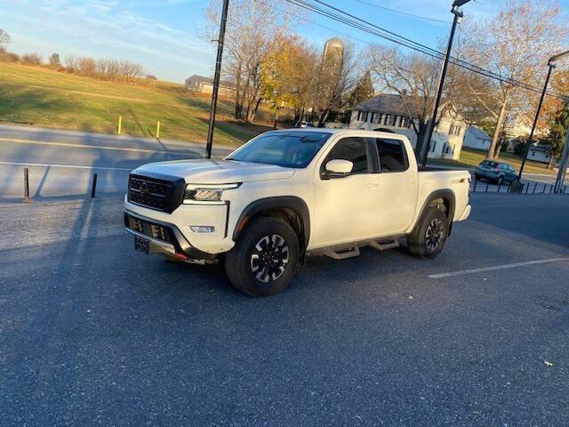 Photo of 2023 Glacier White Nissan Frontier