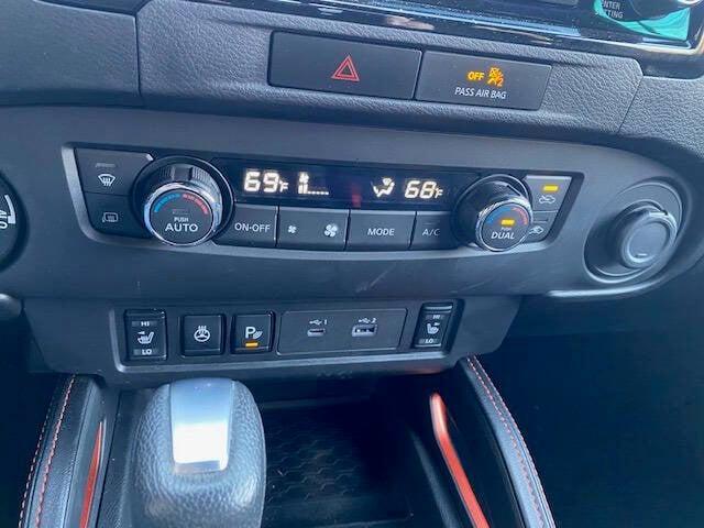Photo of 2023 Glacier White Nissan Frontier