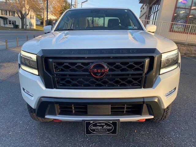 Photo of 2023 Glacier White Nissan Frontier