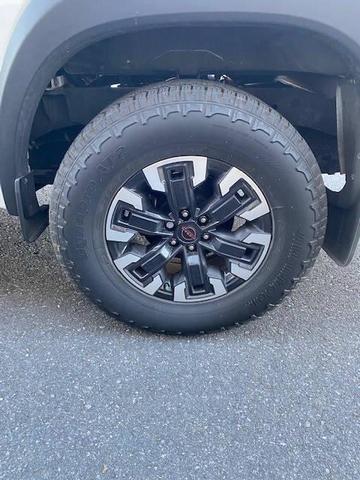 Photo of 2023 Glacier White Nissan Frontier