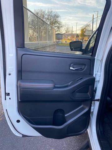 Photo of 2023 Glacier White Nissan Frontier