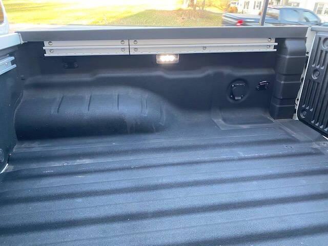 Photo of 2023 Glacier White Nissan Frontier