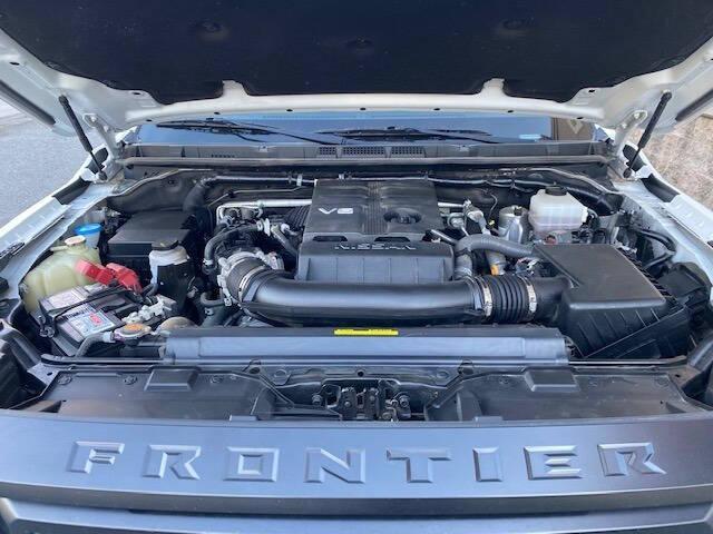 Photo of 2023 Glacier White Nissan Frontier