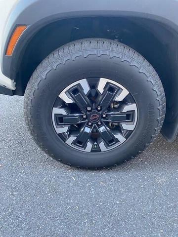 Photo of 2023 Glacier White Nissan Frontier