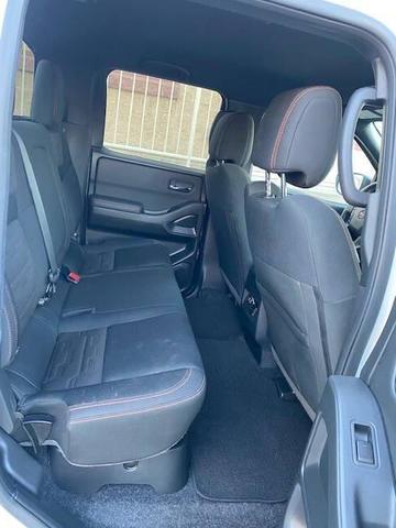 Photo of 2023 Glacier White Nissan Frontier