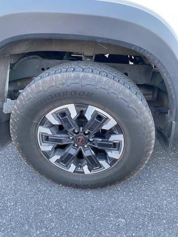 Photo of 2023 Glacier White Nissan Frontier
