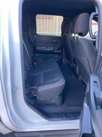 Photo of 2023 Glacier White Nissan Frontier