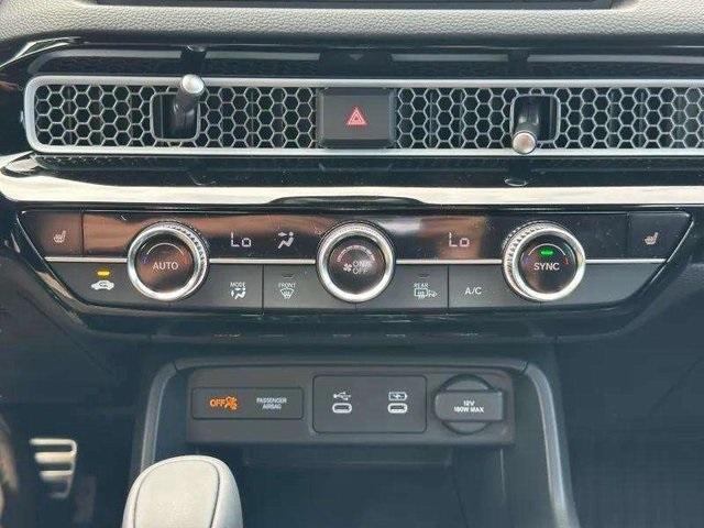 Photo of 2025 Crystal Black Pearl Honda Civic Hybrid