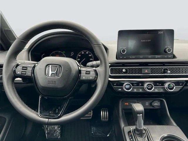 Photo of 2026 Blue Lagoon Honda Civic Hybrid