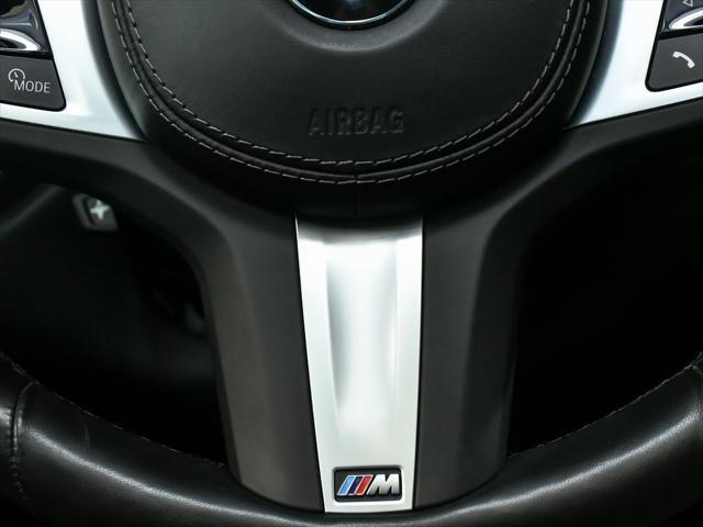 Photo of 2025 Carbon Black Metallic BMW X6