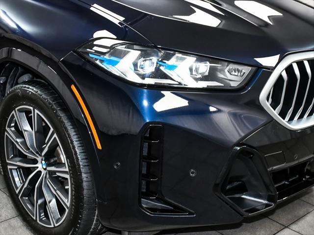 Photo of 2025 Carbon Black Metallic BMW X6