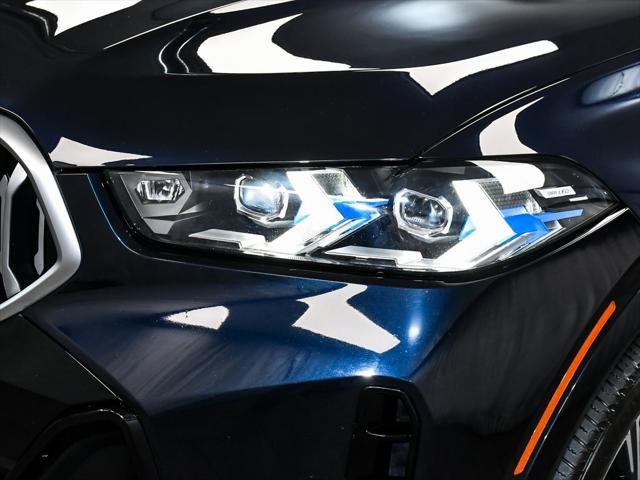 Photo of 2025 Carbon Black Metallic BMW X6
