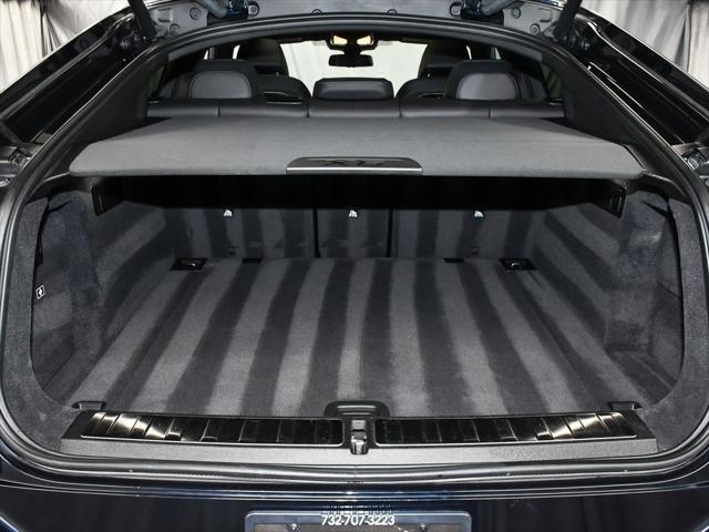 Photo of 2025 Carbon Black Metallic BMW X6