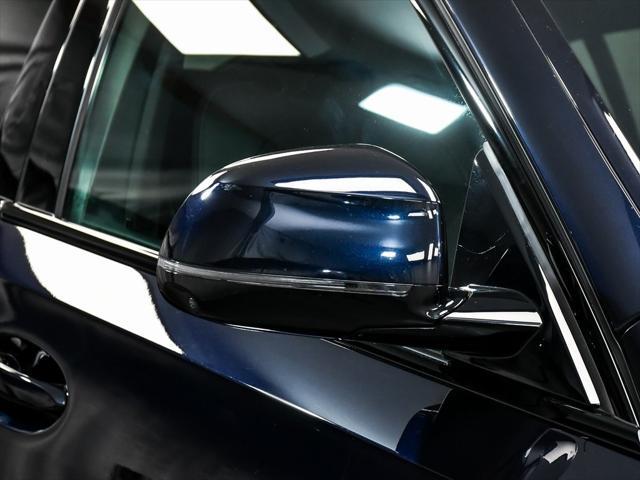 Photo of 2025 Carbon Black Metallic BMW X6