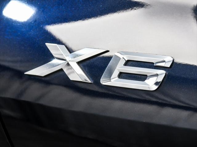 Photo of 2025 Carbon Black Metallic BMW X6