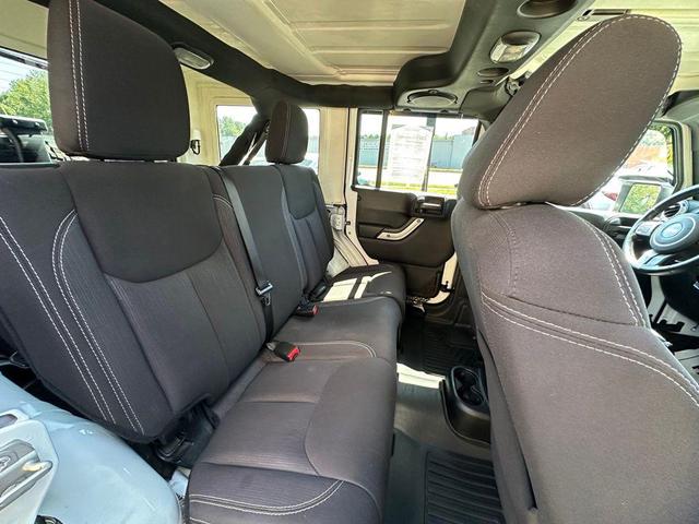 Photo of 2014 Bright White Clearcoat Jeep Wrangler Unlimited