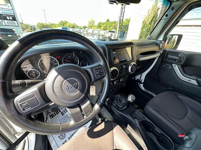 Photo of 2014 Bright White Clearcoat Jeep Wrangler Unlimited