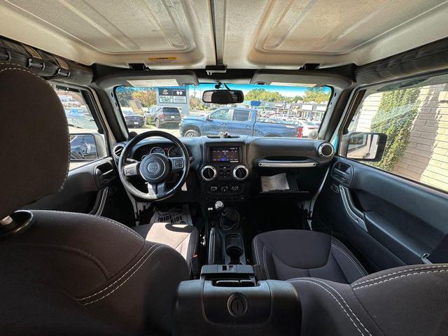Photo of 2014 Bright White Clearcoat Jeep Wrangler Unlimited