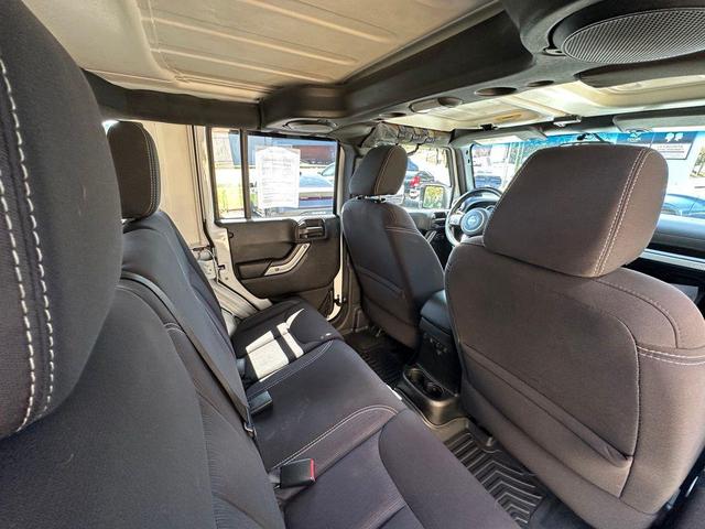 Photo of 2014 Bright White Clearcoat Jeep Wrangler Unlimited