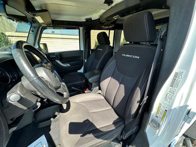 Photo of 2014 Bright White Clearcoat Jeep Wrangler Unlimited