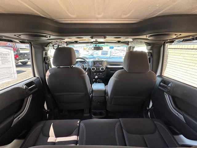 Photo of 2014 Bright White Clearcoat Jeep Wrangler Unlimited