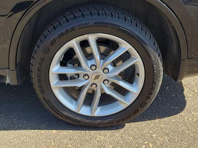 Photo of 2024 DB Black Clearcoat Dodge Durango