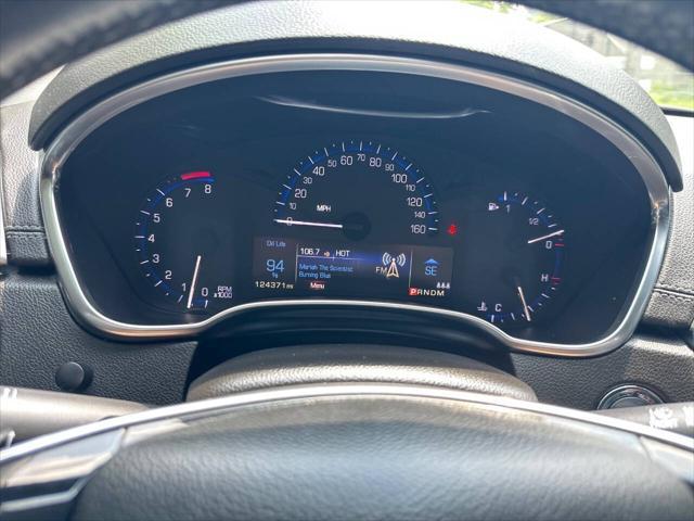 Photo of 2015 White Cadillac SRX