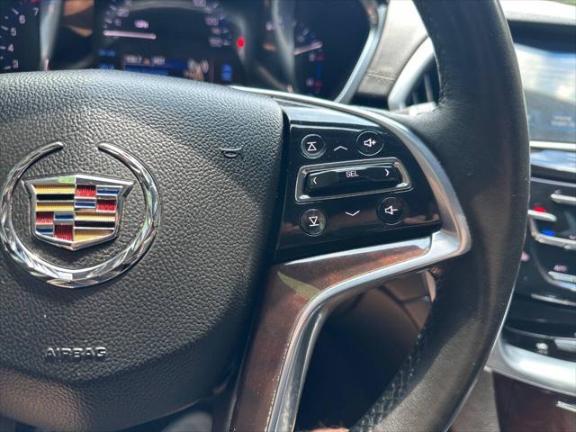 Photo of 2015 White Cadillac SRX
