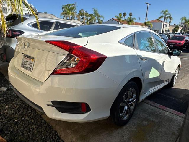 Photo of 2016 White Orchid Pearl Honda Civic