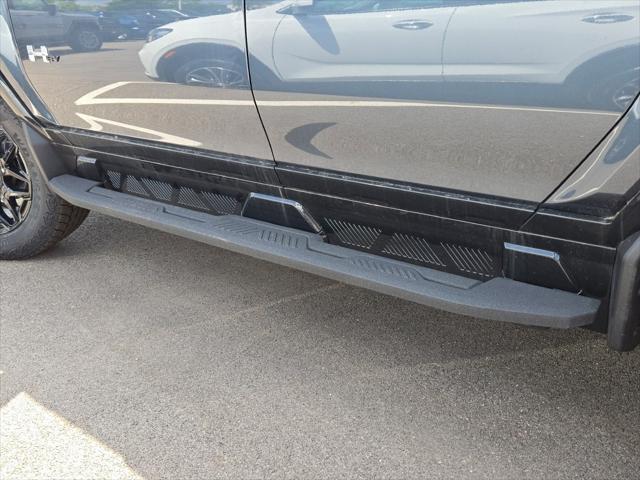 Photo of 2025 Graphite Blue Metallic GMC HUMMER EV SUV