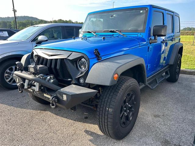 Photo of 2015 Hydro Blue Pearl Coat Jeep Wrangler Unlimited