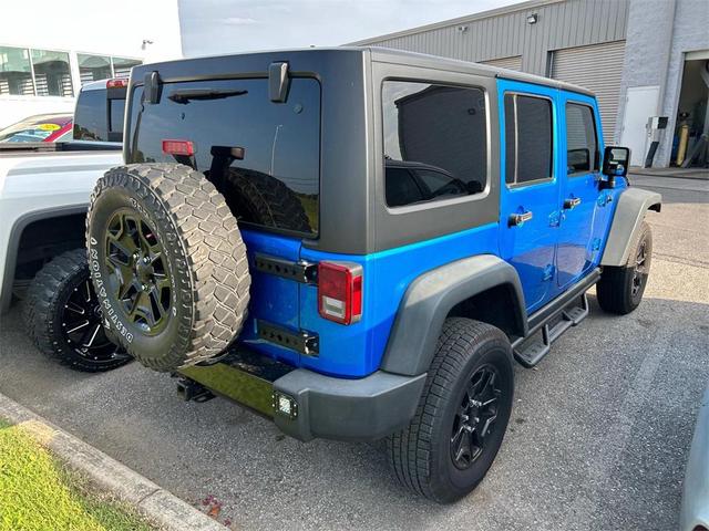 Photo of 2015 Hydro Blue Pearl Coat Jeep Wrangler Unlimited