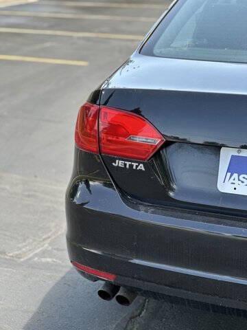 Photo of 2014 Black Uni Volkswagen Jetta