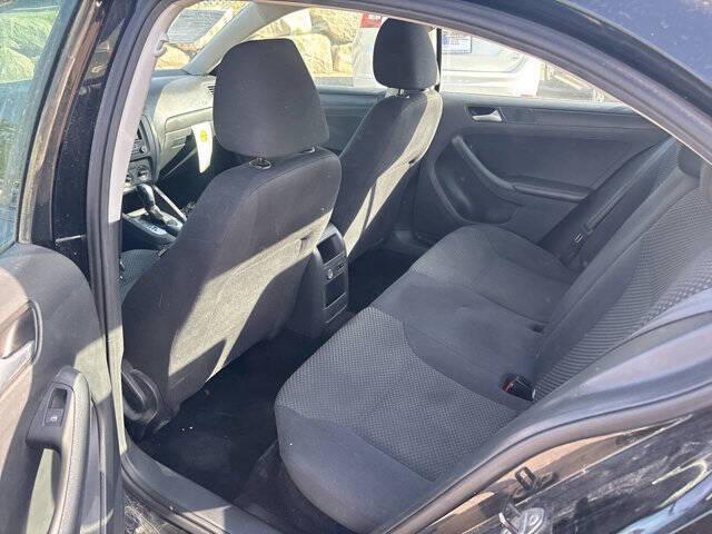 Photo of 2014 Black Uni Volkswagen Jetta