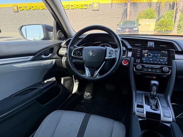 Photo of 2021 Cosmic Blue Metallic Honda Civic